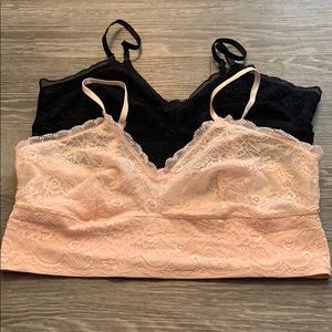 2 pack baby pink and black lace bralettes